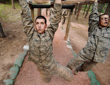 Image of military members completing an obstacle course